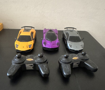 NKOK Remote Control Toy Car Lot of 3 w/ 2 Controllers Orange Purple Silver