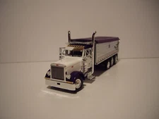 DCP FIRST GEAR 1/64 WHITE&PURPLE TRI-AXLE PETE 379 WITH MAC DUMP BODY DUMP TRUCK