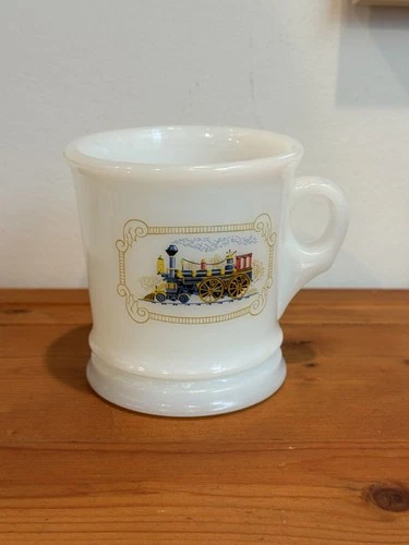 Vintage Avon milk glass shaving mug with a steam locomotive transfer