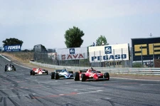 Race winner Gilles Villeneuve CDN Ferrari 126CK leads Jacques Laff- Old Photo