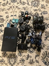 Bundle of PlayStation 2, controller and PlayStation 2 with game Working