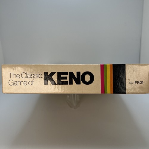 Vintage 1976 Classic Games Co. box with gold logo, “THE CLASSIC GAME OF KENO” text, and multicolor stripe at bottom.