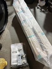 Toshiba Air Conditioning Unit still rapped with information booklets