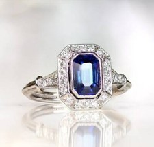 Circa 1880s Vintage Art Deco 2 Carat Emerald Cut Blue  CZ Halo Engagement Ring
