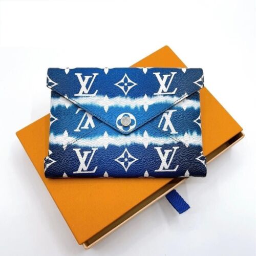 LOUIS VUITTON LV Escale Kirigami Pochette Monogram Giant Blue Size Medium M69119 - Picture 1 of 10