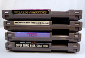 Lotto 4 giochi Nintendo NES Tetris Mario Duck Hunt Wizards & Warriors WWF Steel Cage