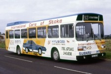 Bus Photo - PMT 262 PEH262M Leyland National International Cars Stoke advert