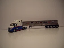 DCP 1/64 SME LOGISTICS FREIGHTLINER CASCADIA W/T SLEEPER & QUAD AXLE WITH LOAD