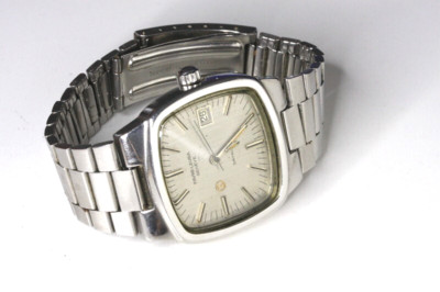 Favre-Leuba Geneve Daymatic Swiss made  watch , runs/stops , for repairs  -22271