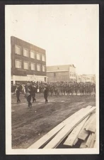 WW1 ERA - MILITARY PARADE ON TOWN S DIRT ROAD (RPPC)