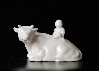 Beautiful signed miniature Porcelain of Boy riding the Bull