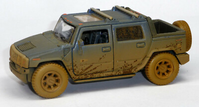 Modellauto SUV Hummer H2 blau im Muddy-Look ca. 1:40 - 11,5 cm von Kinsmart