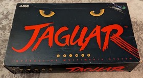 Boxed Atari Jaguar Console with 8 Games, spare controller and instructions.