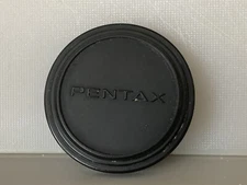 Genuine Pentax 51mm push on front lens cap which will fit 49mm front / filters