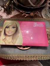 Barbie-themed electronic learning laptop toy manufactured Oregon Scientific.
