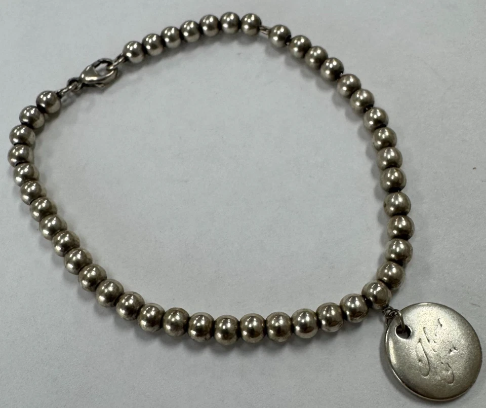 Pulsera Tiffany & Co Plata de Ley 4mm Cuentas "Te Amo" Etiqueta Redonda [105GCS] Foto 3 de 4