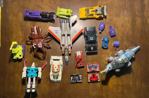 Lot of 16 G1 Transformers plus weapons and accessories Hasbro Takara bonus.