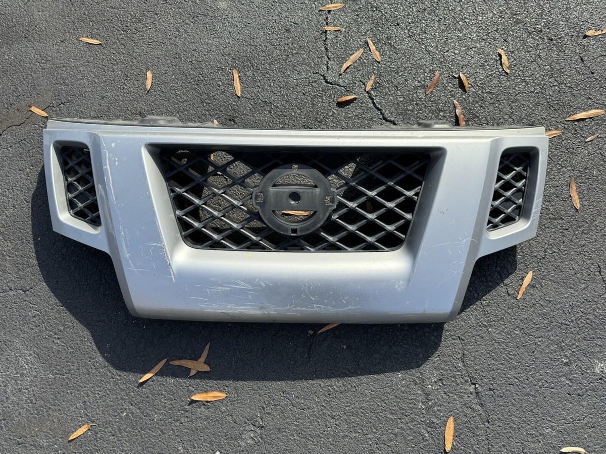 2009-2013 NISSAN XTERRA FRONT BUMPER GRILLE PLASTIC 62310-ZL00A