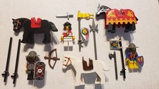 3 LEGO knights warriors, 3 horses, all with a...