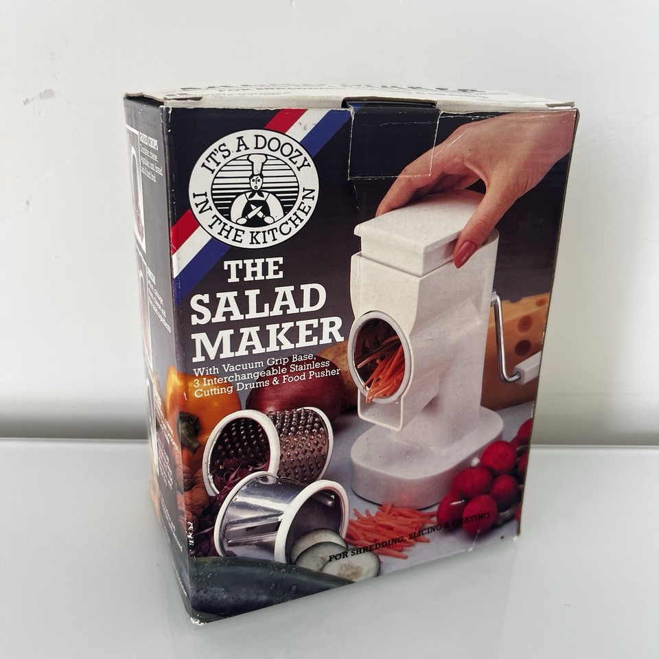 A deadstock 1988 salad maker still in its original box — a pristine time capsule of late-80s kitchen gadget design that actually works as a slicer, shredder, and grater.