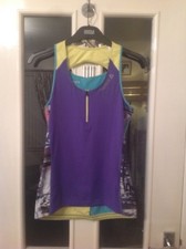 Ladies size M Reebok purple/mint cycle/spin performance vest.