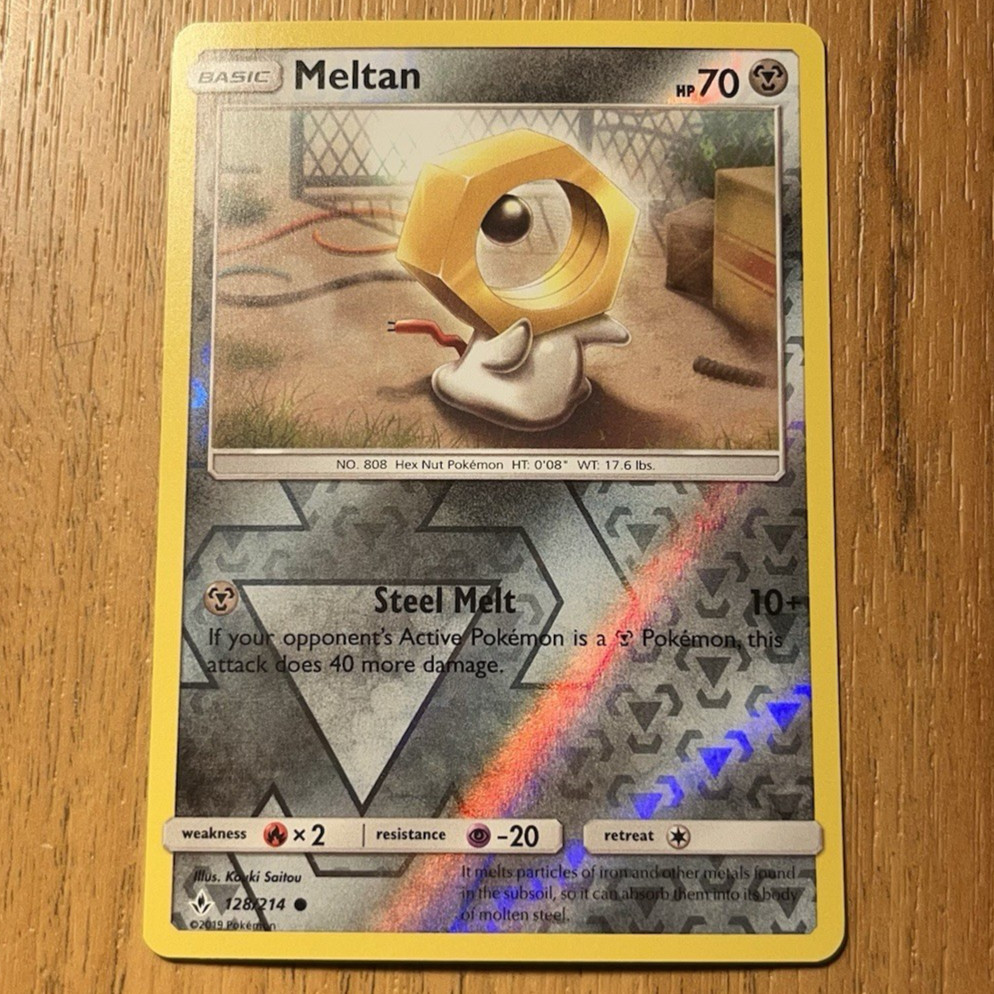Meltan 128/214 Unbroken Bonds Reverse Holo Pokemon Card NM