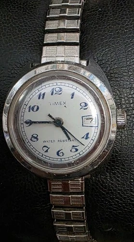 Vintage Timex Silver UFO Manual Date Watch 27mm Womens White Dial