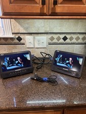 SYLVANIA SDVD1087 Portable Blu-Ray Player set with car charger.