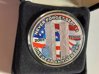 2001 - 2002 1 oz FINE SILVER COLORIZED 9-11 ONE DOLLAR COIN MINT