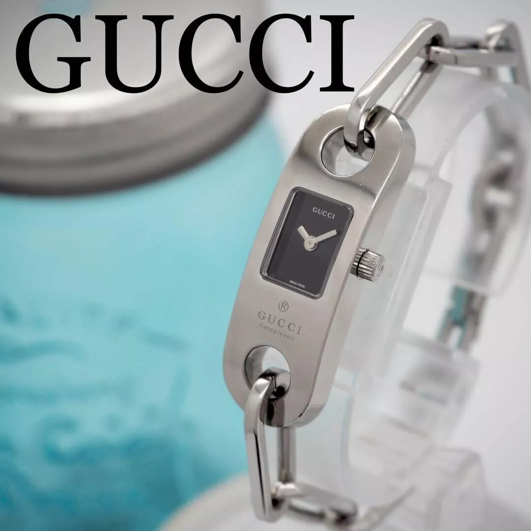 Montre femme Gucci 6100L à quartz cadran noir 13,7 mm tonneau analogique du Japon