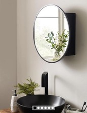 Mirrored bathroom cabinet with magnetic doors and 1 internal shelf.