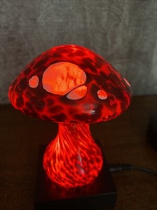 Stuart  Abelman  Signed hand blown red mushroom with white inclusions