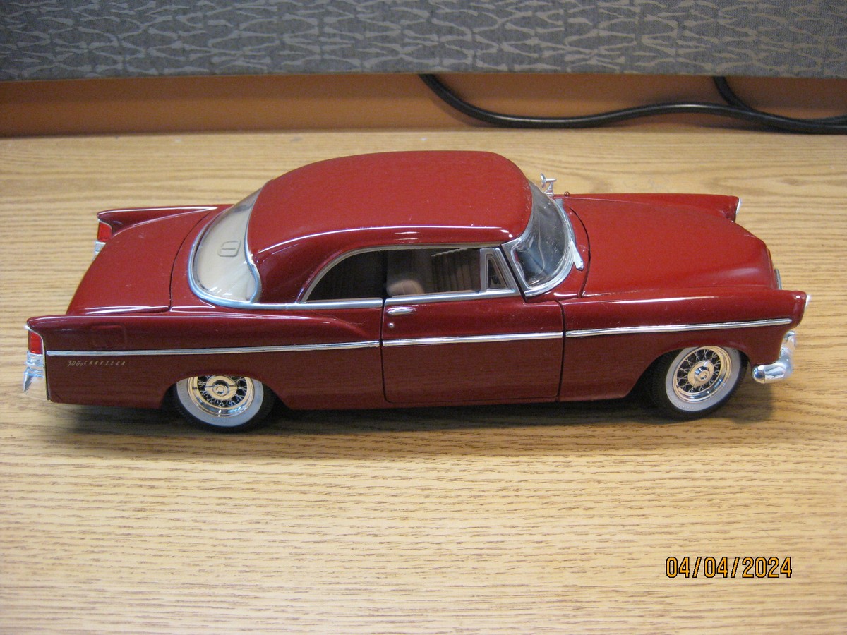 1/18 1956 CHRYSLER 300 B, IN DARK RE OR MAROON , BY MAISTO