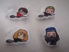 Lot neuf de 4 figurines gommes HARRY POTTER : Harry, Draco, Hermione, Albus