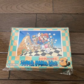 Super Mario Bros. 3 Family Computer with box, one ear missing