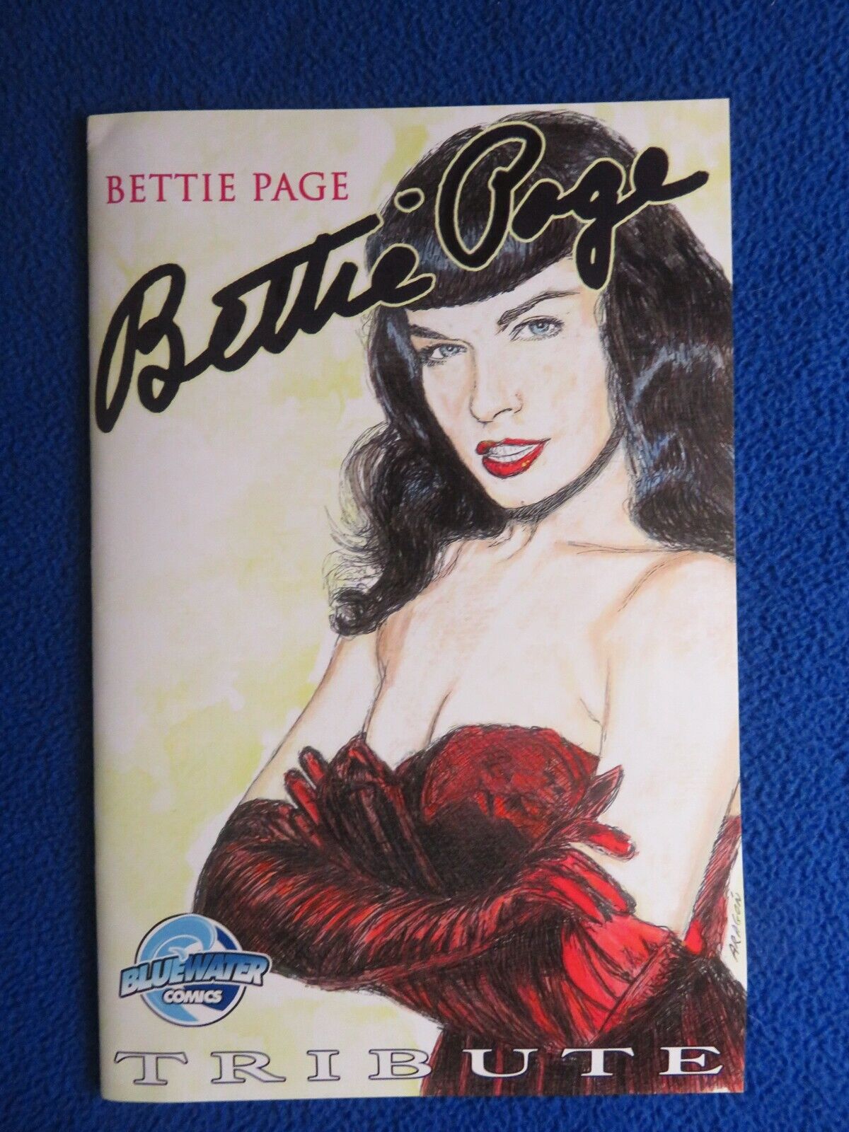 BETTIE PAGE TRIBUTE  BLUEWATER COMICS