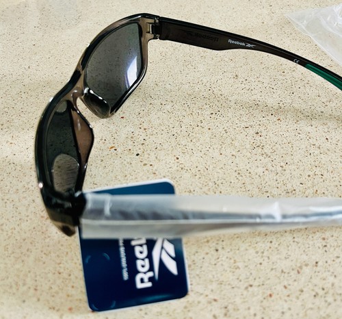 Nuevas gafas de sol Reebok Sports NEGRAS Clase 8 UVA/UVB 100 % protección - RBK - Imagen 9 de 12