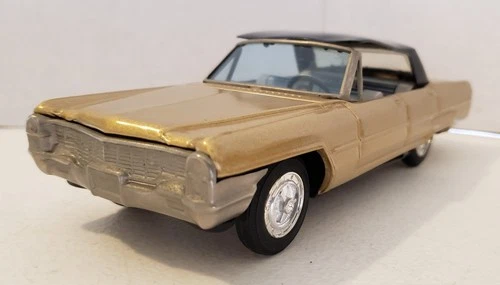 Vintage 1965 Gold Cadillac Friction Powered 8" Tin Toy Car - Bandai of Japan