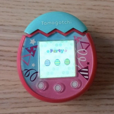 Tamagotchi Pix Party elektronisches virtuelles Haustierspielzeug pink & blau MPN 97180702