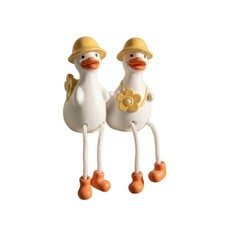 Cartoon-Ente Dekoornament Detailreich Dekofigur mit Blumendetail Verschmitzt