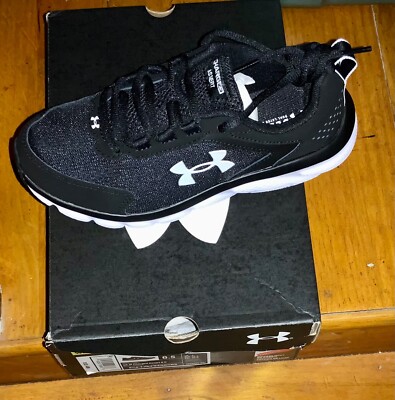 UA W Charged Assert 9 D Black and White Women s  6.5 D