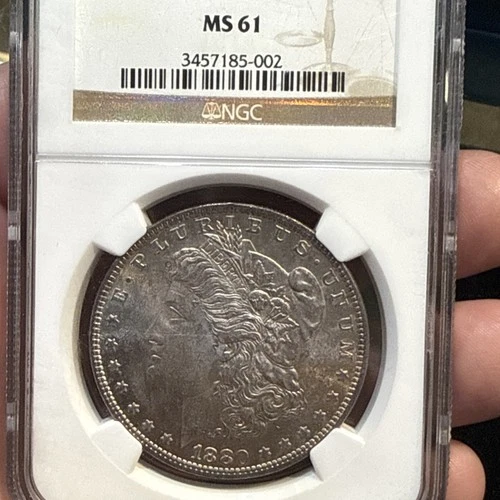 1880-O Morgan Silver Dollar NGC MS 61 Holder Scratchy Coin Toned.