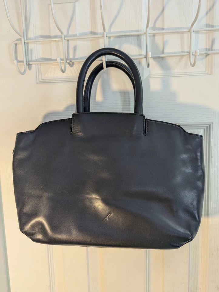 Bolso de Mano Brian Atwood Cuero Negro Borla Central Frontal Cremallera Herrajes Dorados 15w 9t Foto 4 de 4