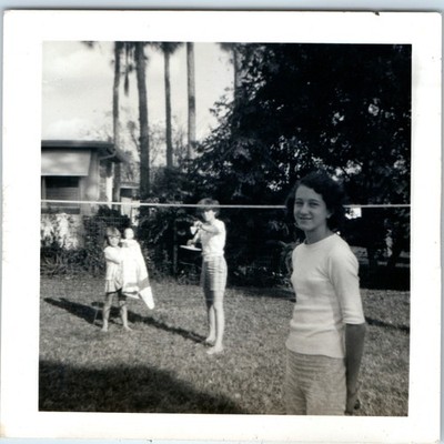 1960s Happy Family Snapshot Photo Palm Tree Teen Girl Doll Baby Ping Pong Cute