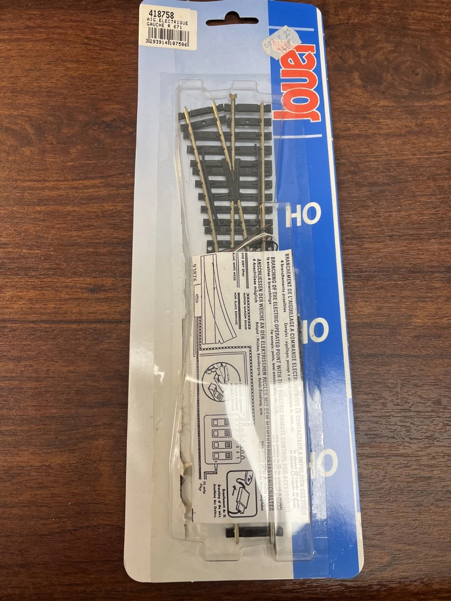 Un aiguillage électrique gauche électrique de Jouef au H0 HO miniatures