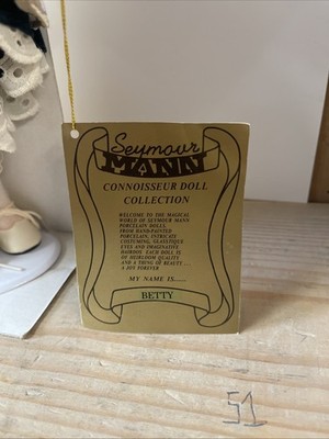 CONNOISSEUR COLLECTION PORCELAIN DOLL FROM SEYMOUR MANN 