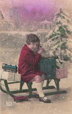 CP ROSE BONNE ANNEE PETITE FILLE SUR LUGE CADEAUX LOCOMOTIVE - 55860