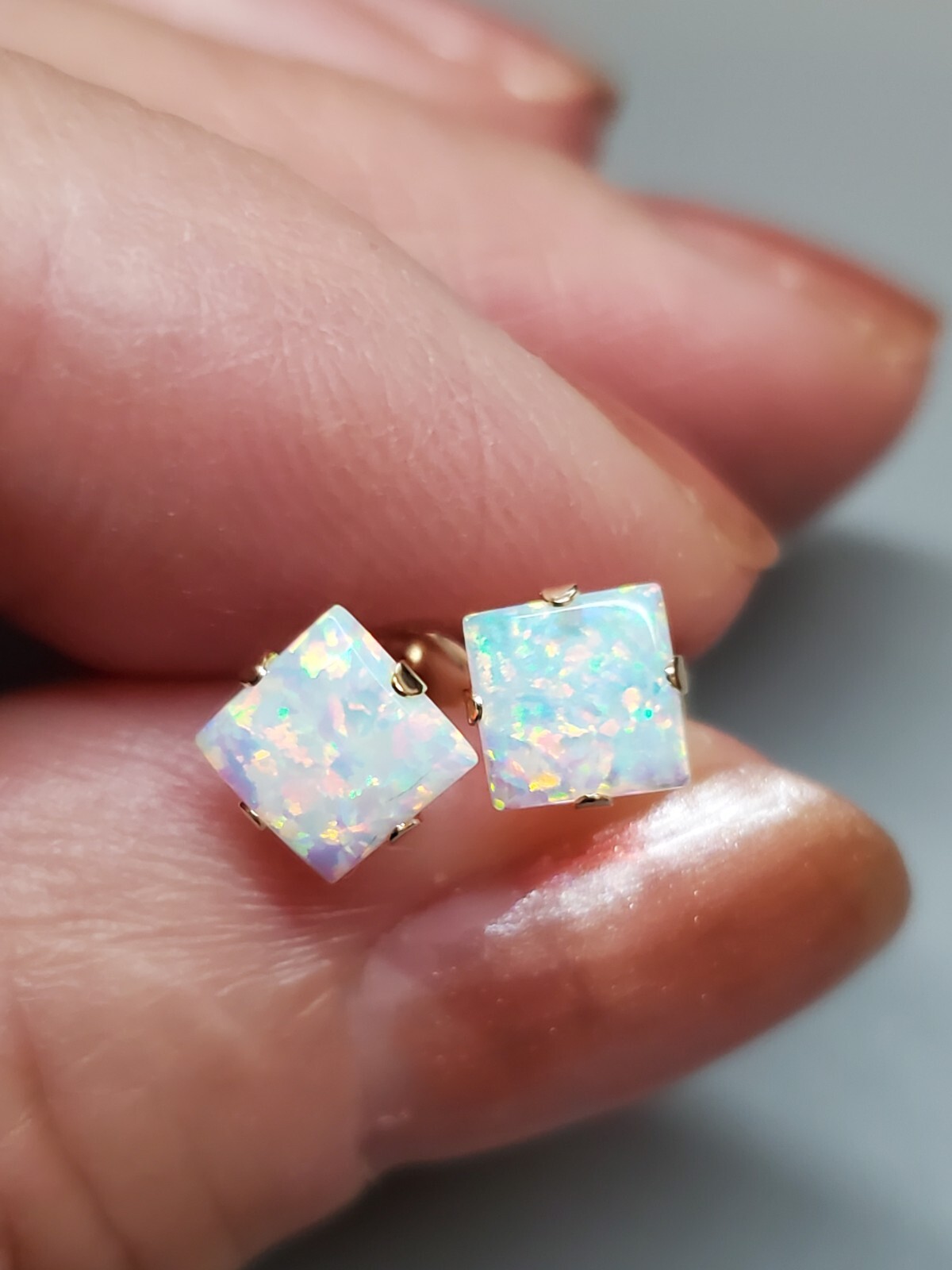 Elegant 10K Yellow Gold Stud Earrings Featuring Created Opals-image