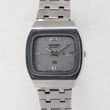 Vintage Seiko SQ Quartz Men's Watch 8223-5080 Silver Dial, Ar En Day/Date 1989