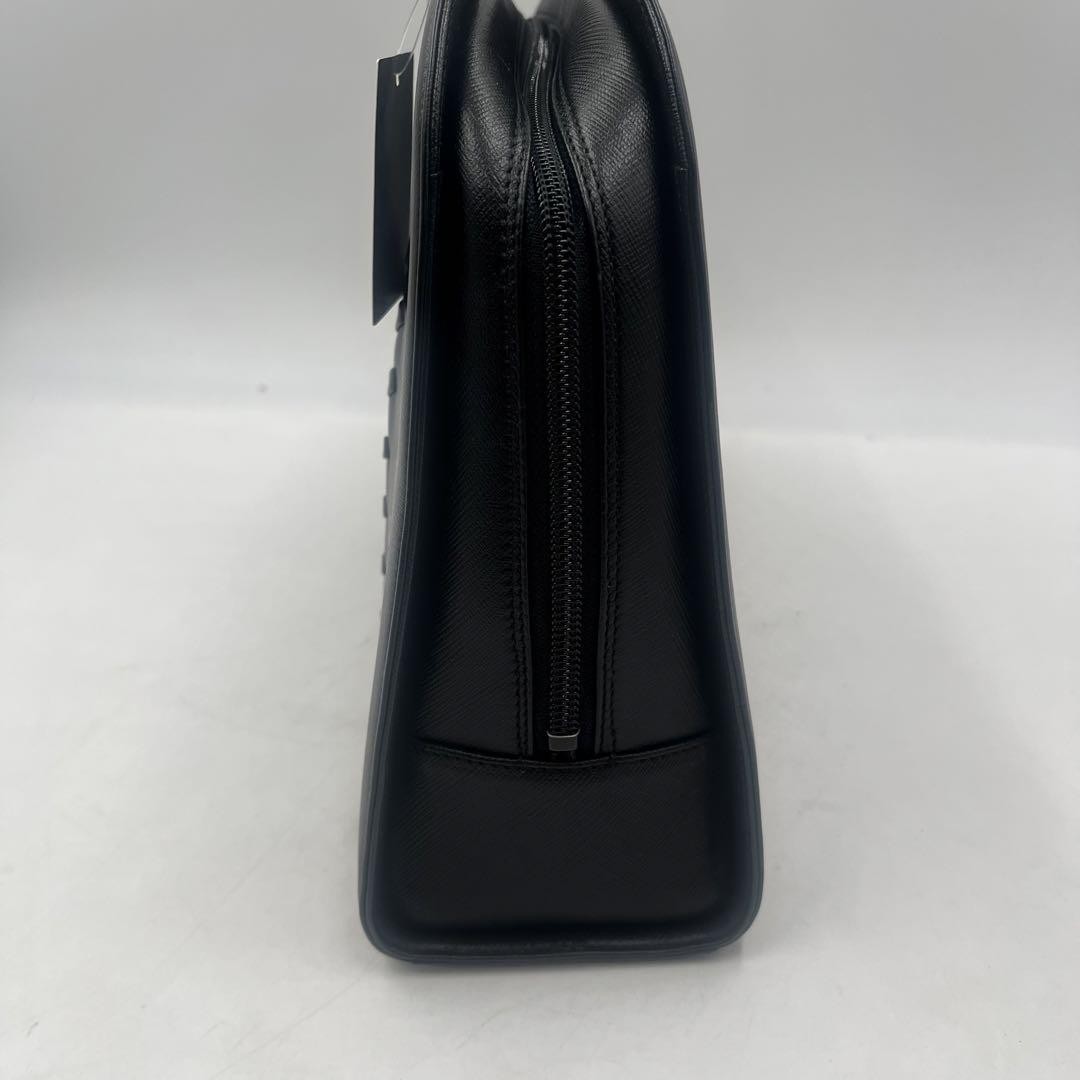 Borsa a tracolla Yves Saint Laurent nera fondo di magazzino con disegno punto etichetta